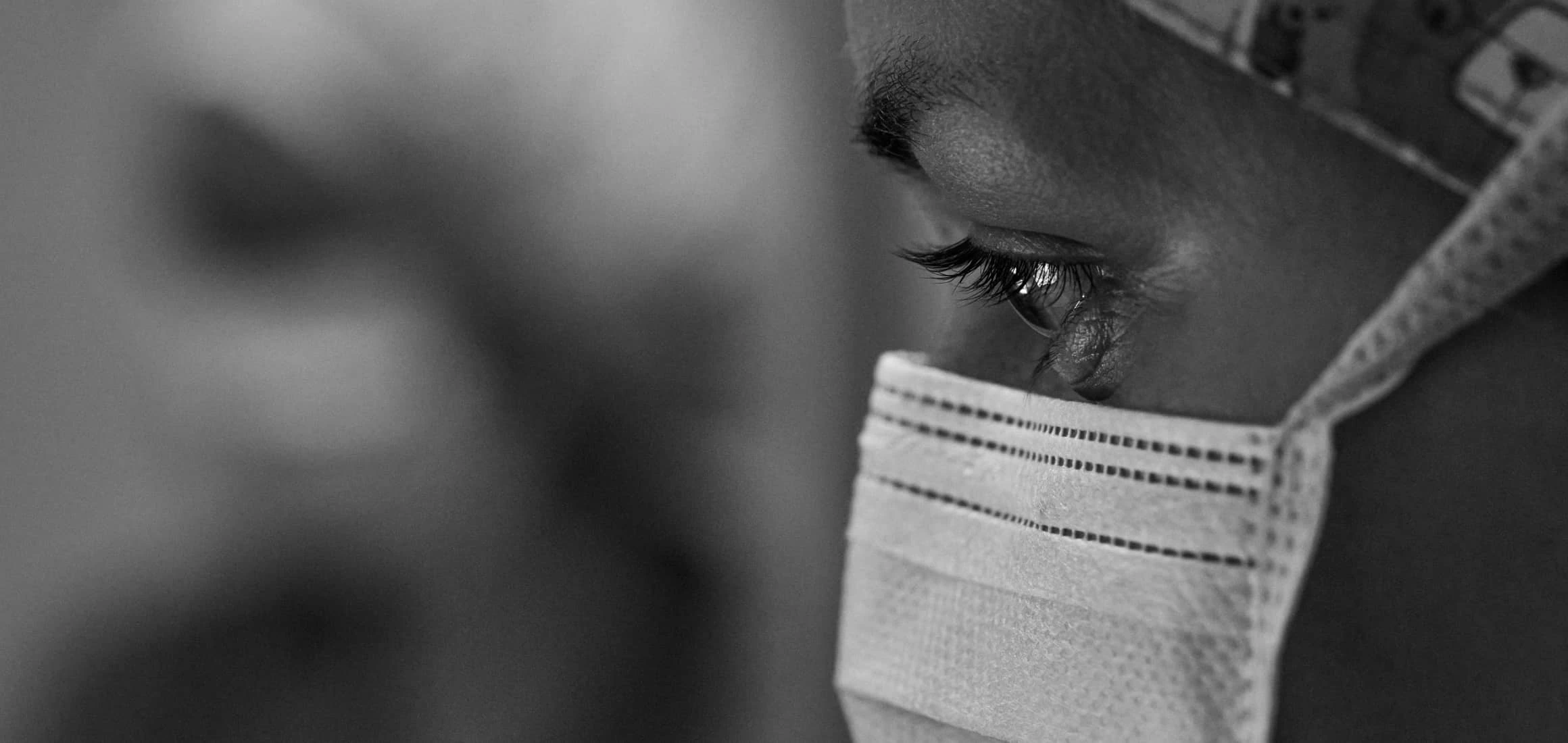 A medic wearing a protective mask